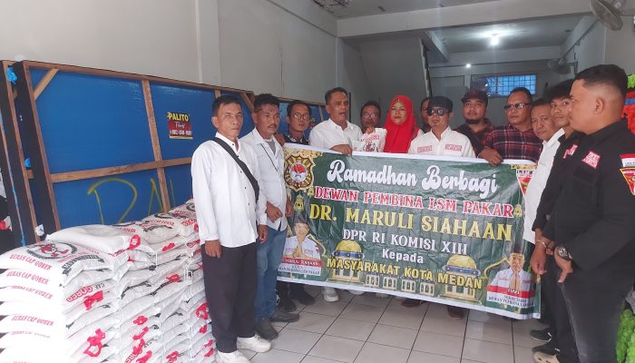 Indahnya Berbagi, Anggota DPR RI Komisi XIII Maruli Siahaan Salurkan 100 Paket Beras Jelang Idul Fitri